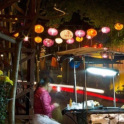 Traditional Vietnamese lamp as a light at a foodstall